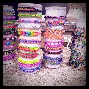 Loomed bracelets  and pencils grip with pencil